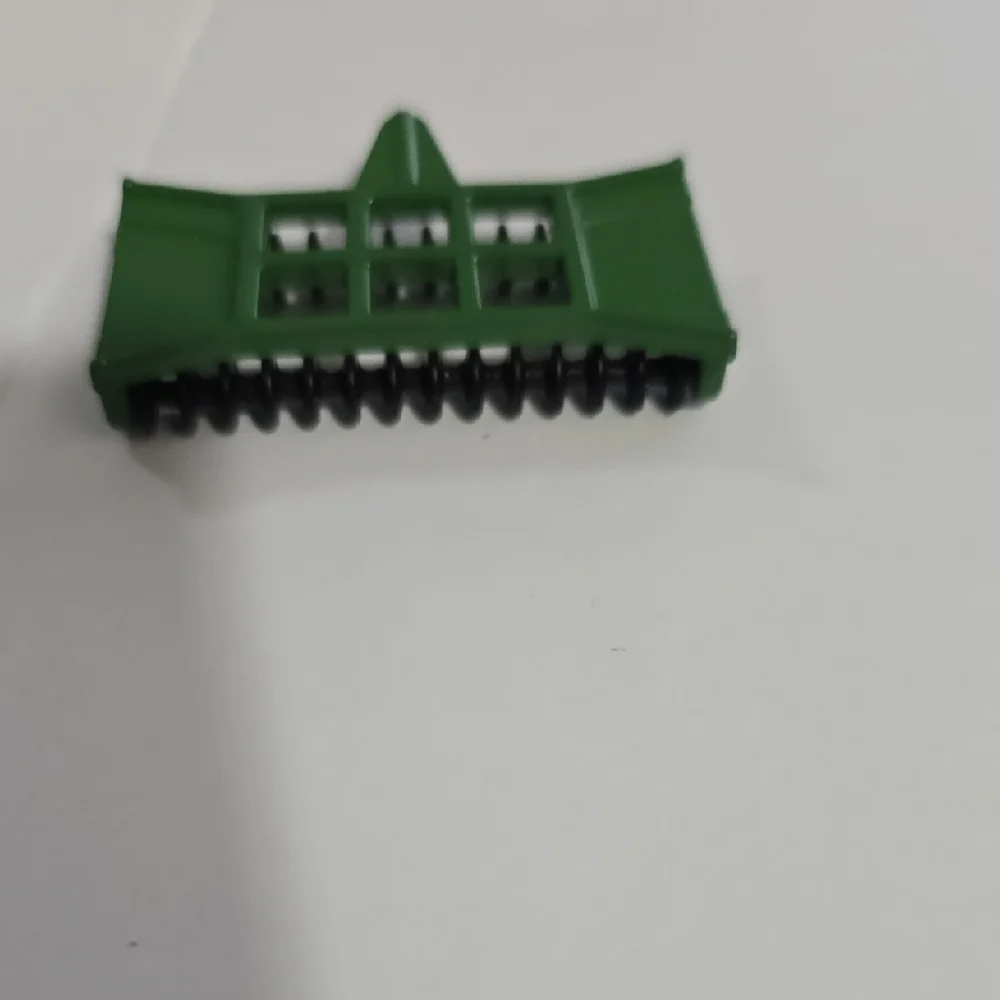 Toy John Deere combine corn head, likely an Ertl 1/64 scale model.